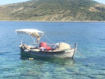 Nautical vessel on sea against sky