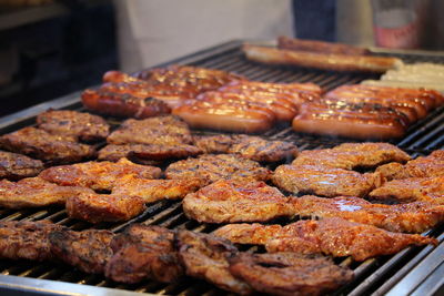 Close-up of meat on barbecue grill