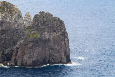 Scenic view of rock formation in sea