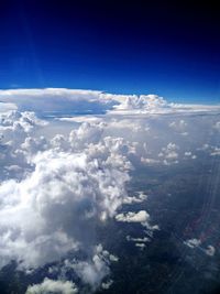 Aerial view of clouds over blue sky