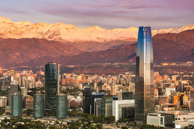 High angle view of city by mountain