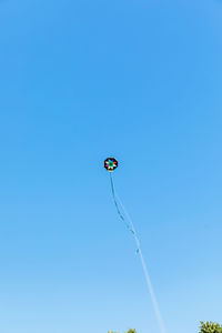 Low angle view of kite flying in sky