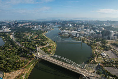 High angle view of city at riverbank