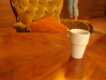 Close-up of cup on table