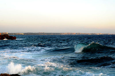 Scenic view of sea against clear sky