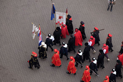 High angle view of band marching on street