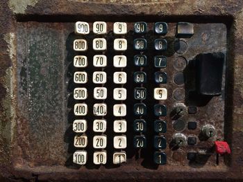 Close-up of old telephone booth