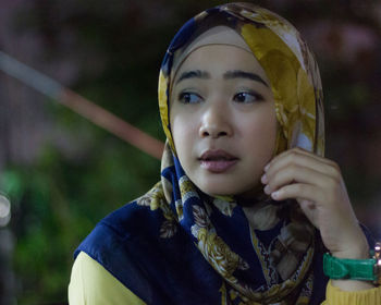 Close-up of woman looking away