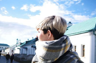 Portrait of young man against sky