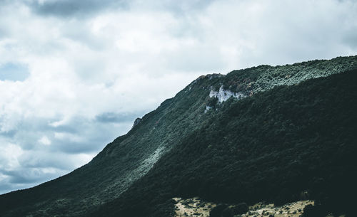 Low angle view of mountain against sky