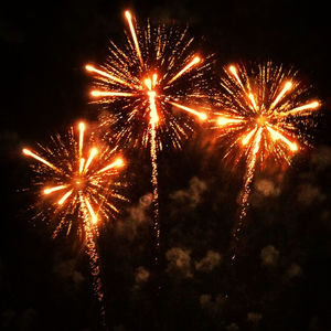 Low angle view of firework display