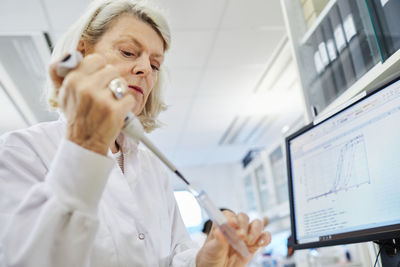 Woman working in laboratory