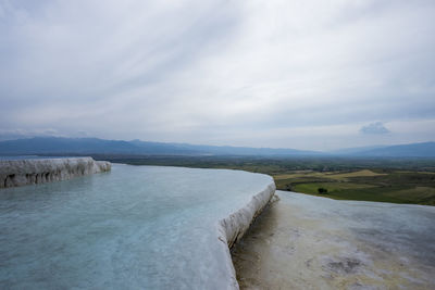 Scenic view of river against sky