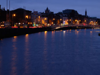 View of illuminated city at waterfront