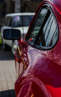 Close-up of car on side-view mirror