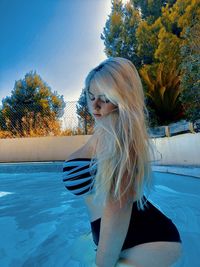 Young woman in swimming pool