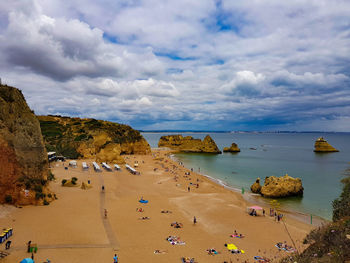 High angle view of people on beach against sky