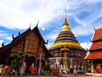 Group of people in temple against building