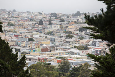 Aerial view of townscape against sky