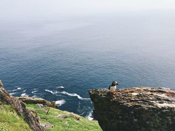 High angle view of sea and rock formations