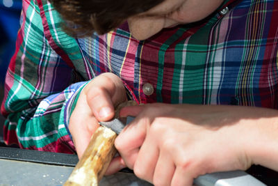 Close-up of woman holding hands