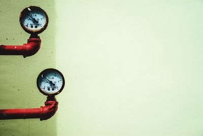 Close-up of clock on wall