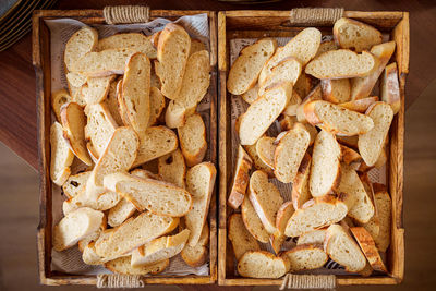 Slices of bread in wooden basket