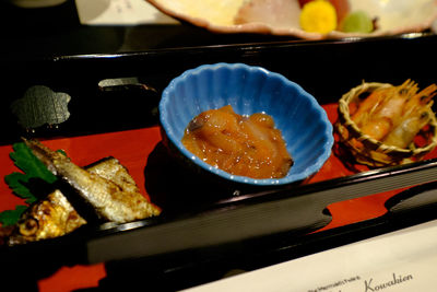 High angle view of seafood served in bowl and plate