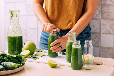 Midsection of woman holding food