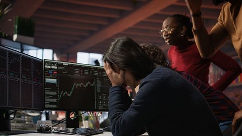 Side view of man working at airport