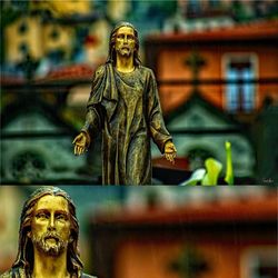 Close-up of statue against building