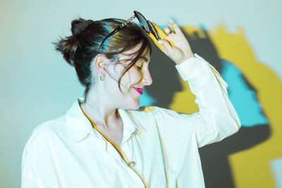 Close-up of young woman looking away