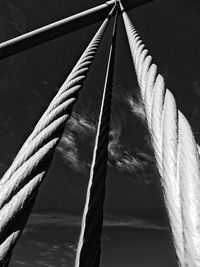 Low angle view of ropes against sky