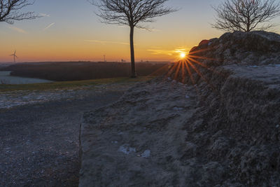 Scenic view of landscape against sky during sunset
