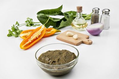 Close-up of food on table against white background