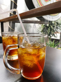 Close-up of beer in glass on table