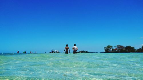 Scenic view of sea against blue sky