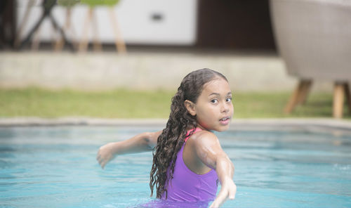 Portrait of a girl in swimming pool