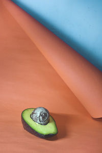 High angle view of avocado fruits on table