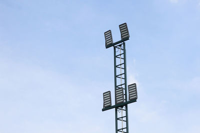 Low angle view of road sign against sky