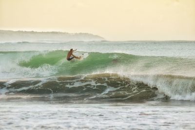 Man surfing in sea