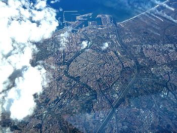 Aerial view of cityscape against sky