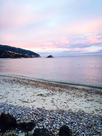 Scenic view of sea at sunset