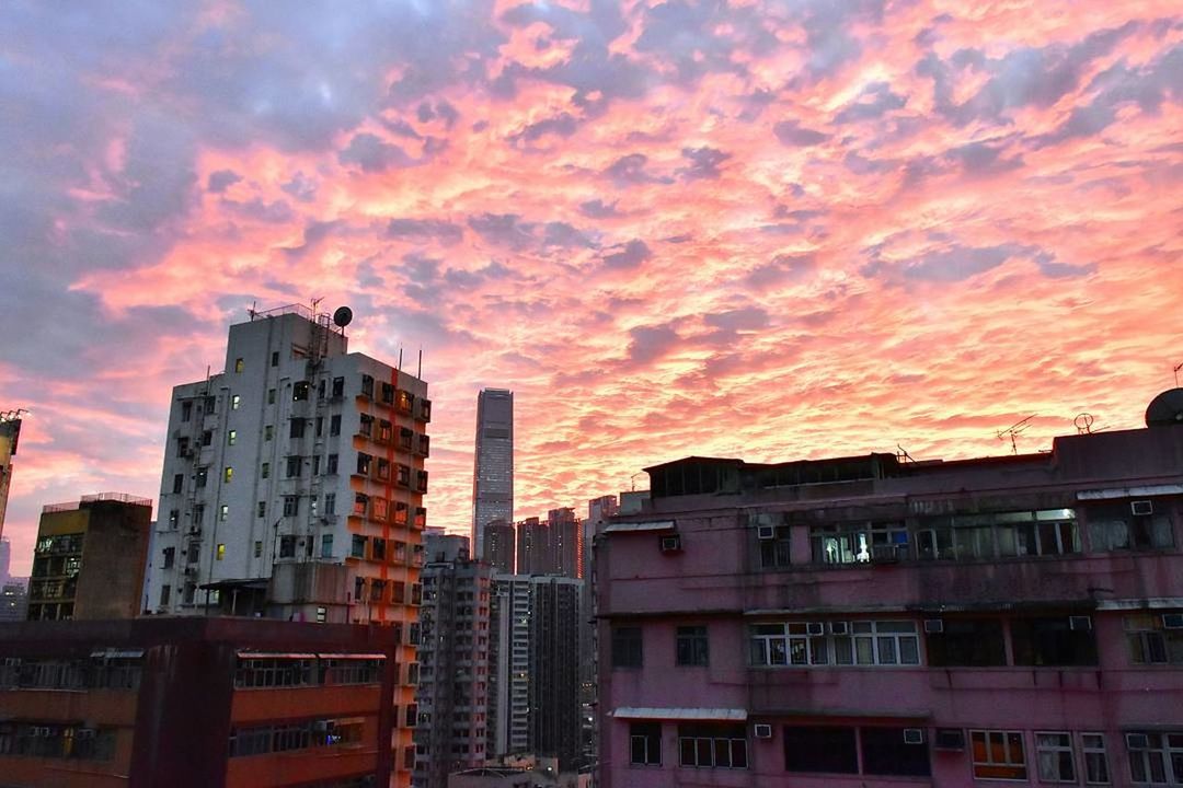 BUILDINGS IN CITY AGAINST SKY