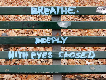 Close-up of information sign on metal