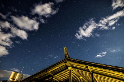 Low angle view of built structure against cloudy sky