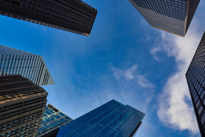 Low angle view of modern buildings against sky