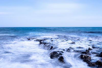 Scenic view of sea against clear sky