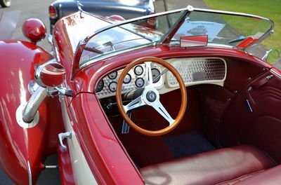 Close-up of red vintage car