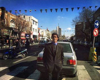 Portrait of woman standing in park